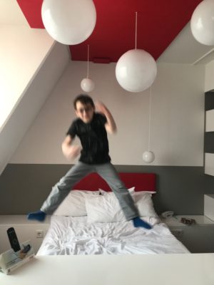 My son jumping for joy at Ibis Styles hotel in Aachen. It might have had something to do with the make-your-own pancake machine downstairs.